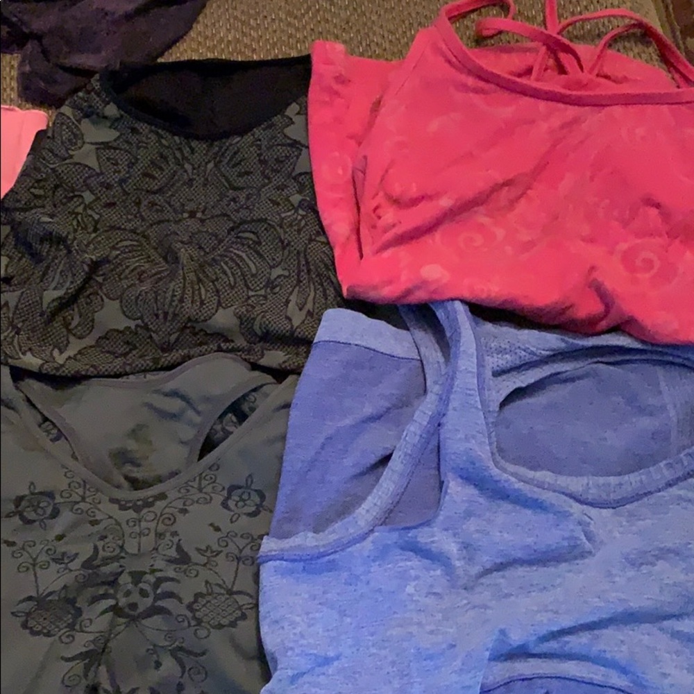 9 work out tops size small some never worn .